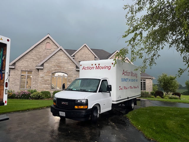 Moving truck near a home by the lake