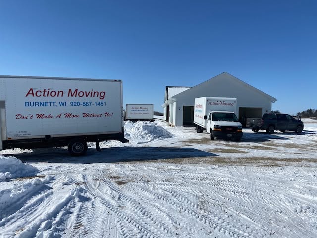 Moving truck at a home in the winter